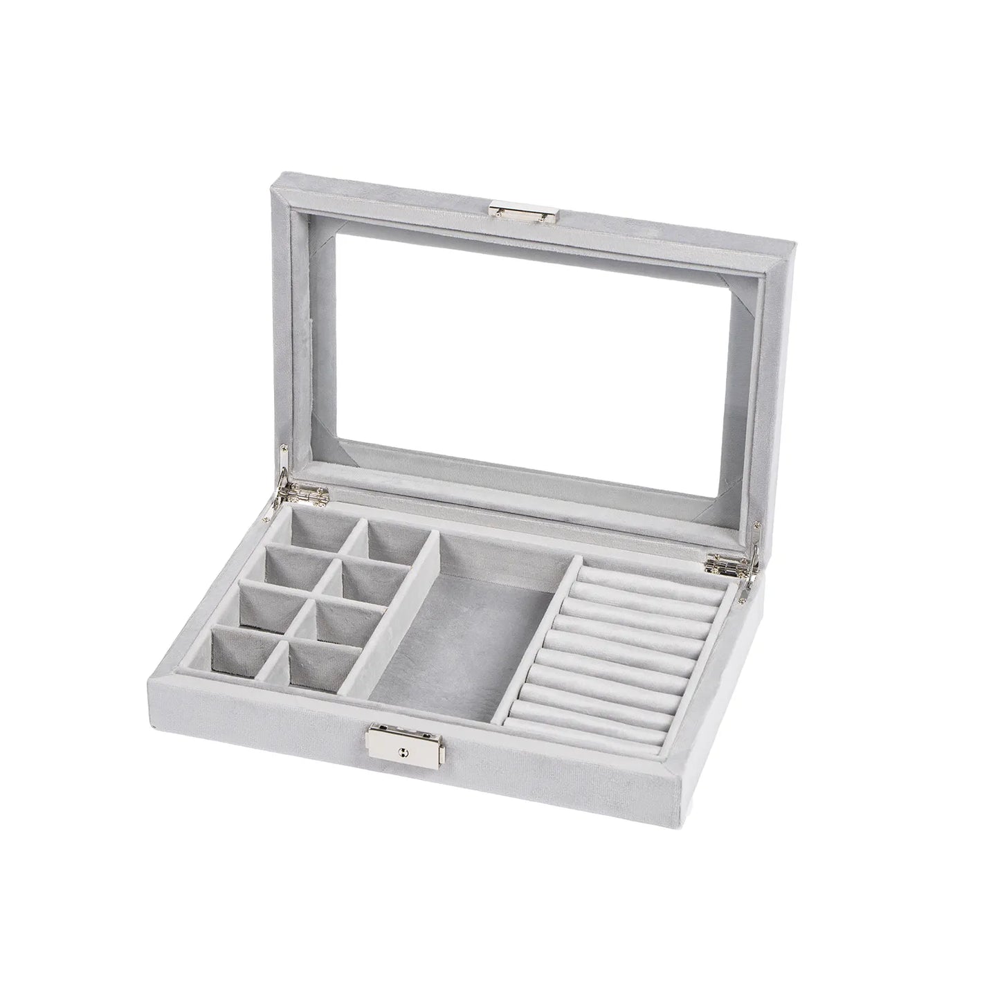 Grátt smúkkuskrín við fleiri rúmum og glas rútið. Víst upplatið. 