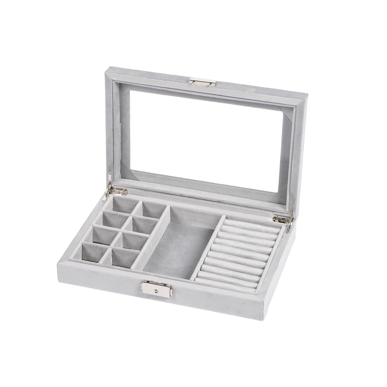 Grátt smúkkuskrín við fleiri rúmum og glas rútið. Víst upplatið. 